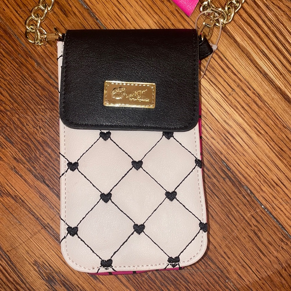Stylish Pink, white, and black crossbody purse